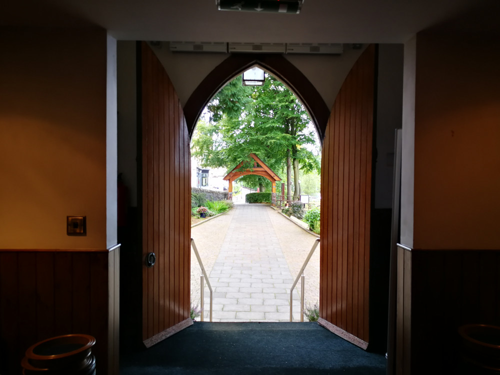 church doors open looking out